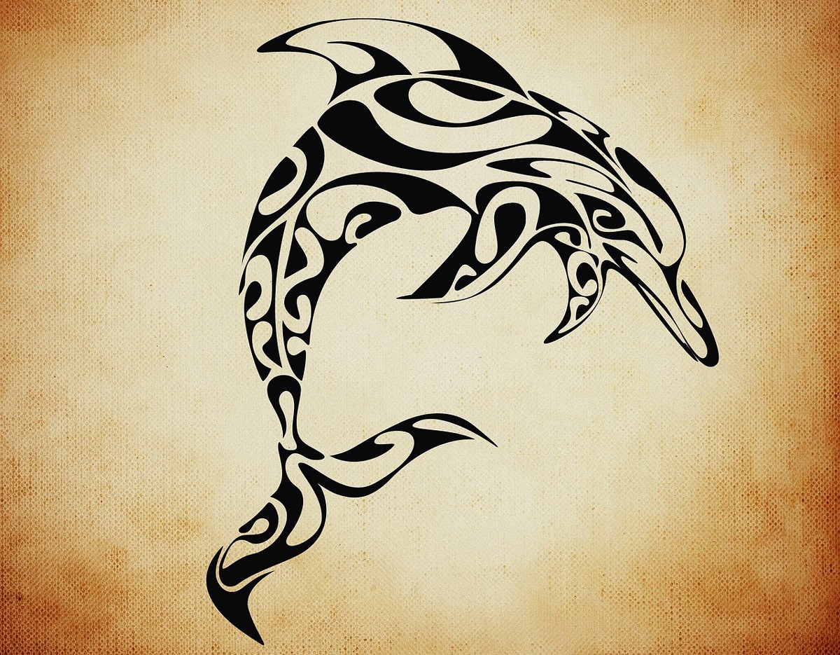 Dolphin Tattoos & Dolphin Tattoo Meanings
