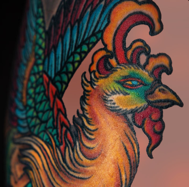 Chinese phoenix tattoo based on the Yamaha logo