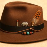 Why does Phil have a matchstick in his hat?